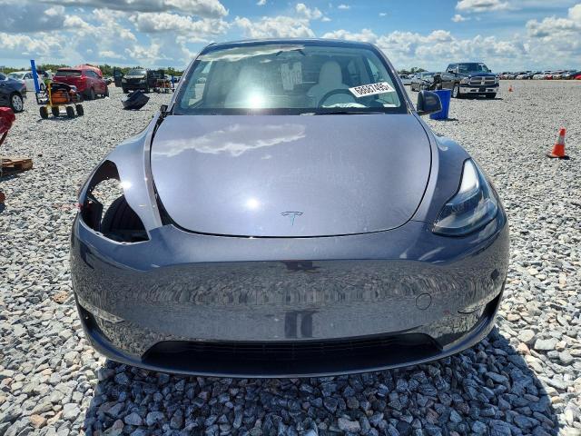 Photo 5 from auction – 2023 TESLA MODEL Y with VIN 7SAYGAEE7PF946507