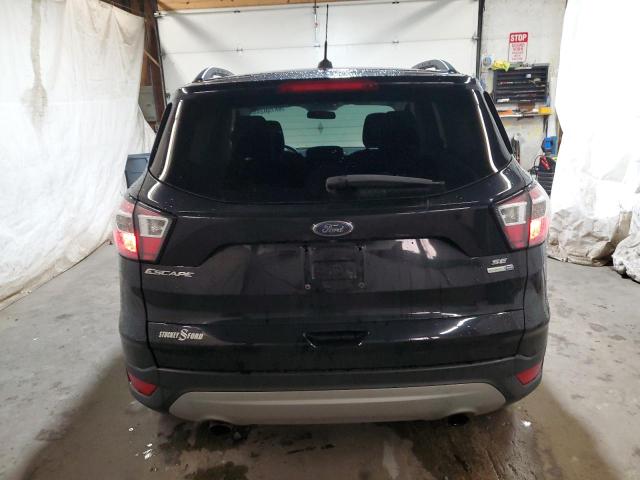 Photo 6 from auction – 2018 FORD ESCAPE SE with VIN 1FMCU9GD3JUA32462