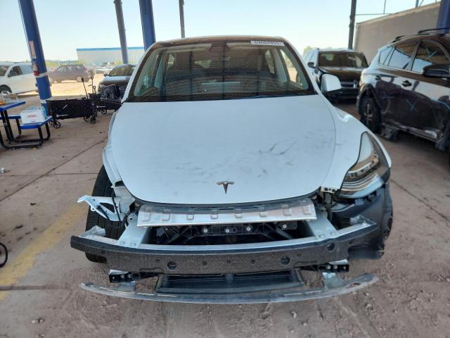 Photo 5 from auction – 2023 TESLA MODEL Y with VIN 7SAYGDEE0PA050659