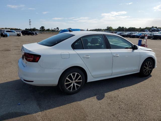 Photo 3 from auction – 2018 VOLKSWAGEN JETTA SE with VIN 3VWDB7AJ4JM237761