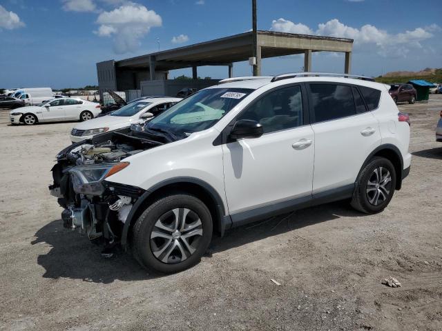 TOYOTA RAV4 LE 2018 with VIN 2T3BFREV6JW770975 - Photo from auction