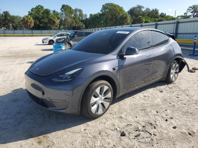 TESLA MODEL Y 2023 with VIN 7SAYGDED8PF958853 - Photo from auction