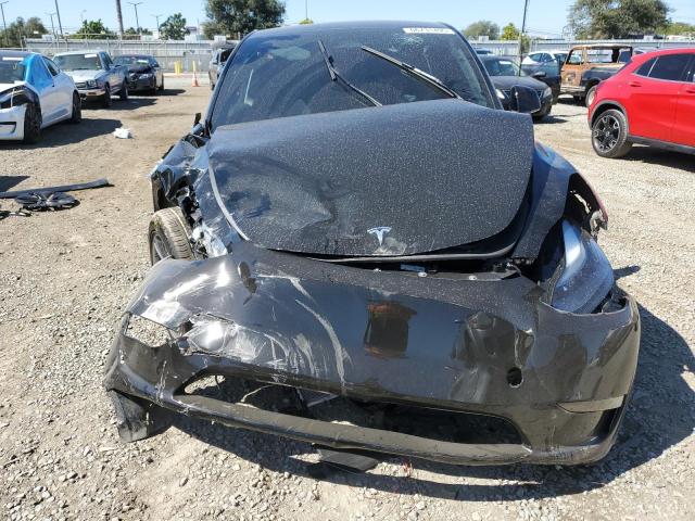 Photo 12 from auction – 2025 TESLA MODEL Y with VIN 7SAYGDEDXSF320368