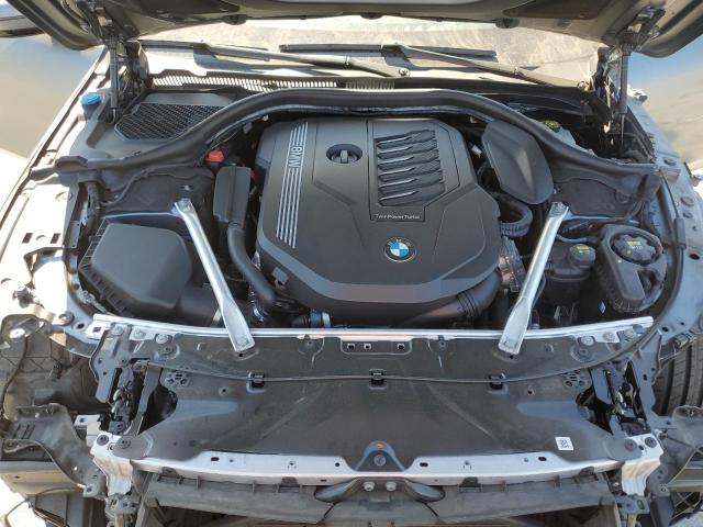 Photo 11 from auction – 2022 BMW 840I with VIN WBAGV2C05NCJ40779