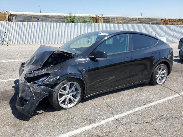 TESLA MODEL Y 2023 with VIN 7SAYGDEE2PA125832 - Photo from auction