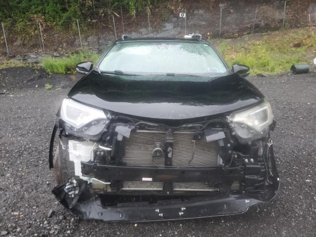 Photo 5 from auction – 2017 TOYOTA RAV4 XLE with VIN 2T3RFREV4HW662427