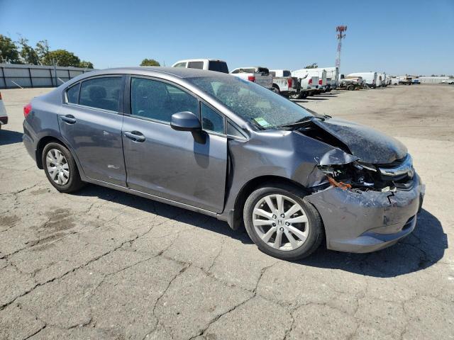 Photo 4 from auction – 2012 HONDA CIVIC LX with VIN 2HGFB2F59CH571958