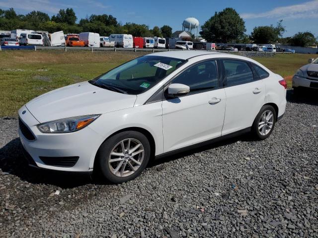 FORD FOCUS SE 2016 with VIN 1FADP3F24GL210218 - Photo from auction