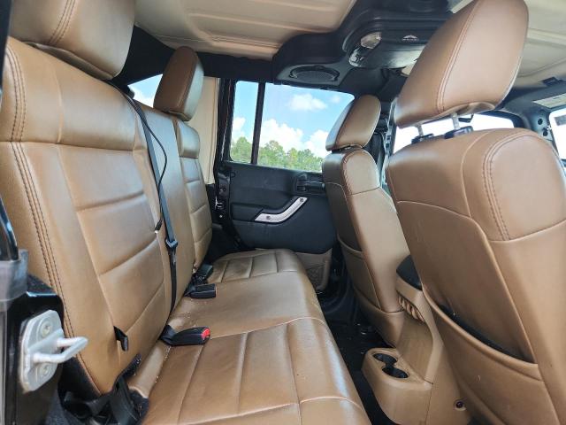 Photo 11 from auction – 2011 JEEP WRANGLER U with VIN 1J4BA5H15BL543100