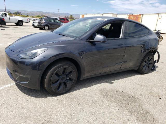 TESLA MODEL Y 2024 with VIN 7SAYGDED2RF126105 - Photo from auction