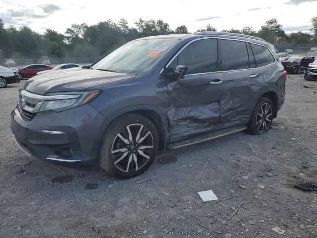 HONDA PILOT ELITE 2020 with VIN 5FNYF6H06LB057611 - Photo from auction