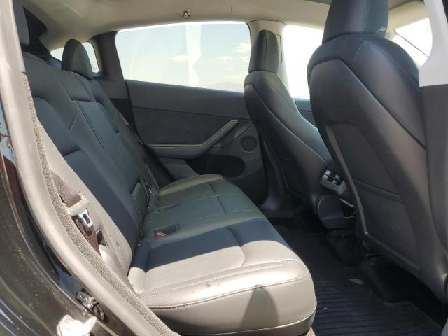 Photo 11 from auction – 2023 TESLA MODEL Y with VIN 7SAYGDEE5PA169985