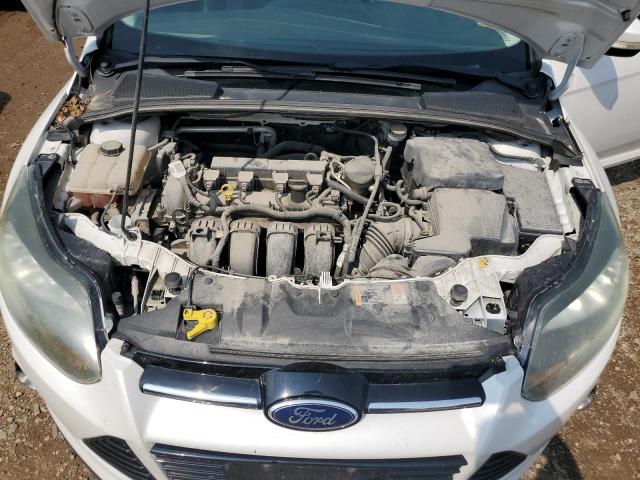 Photo 11 from auction – 2014 FORD FOCUS TITA with VIN 1FADP3J20EL339576