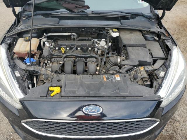 Photo 11 from auction – 2018 FORD FOCUS SE with VIN 1FADP3F23JL272572