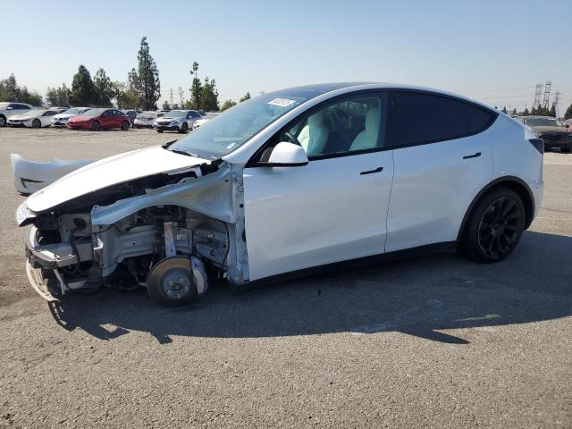 TESLA MODEL Y 2022 with VIN 7SAYGDEEXNF534712 - Photo from auction