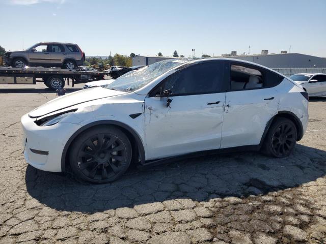 TESLA MODEL Y 2022 с VIN 7SAYGAEE7NF429785 - Фото с аукциона