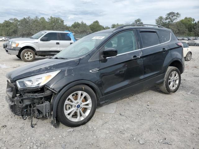 FORD ESCAPE SE 2018 with VIN 1FMCU9GD9JUC89898 - Photo from auction