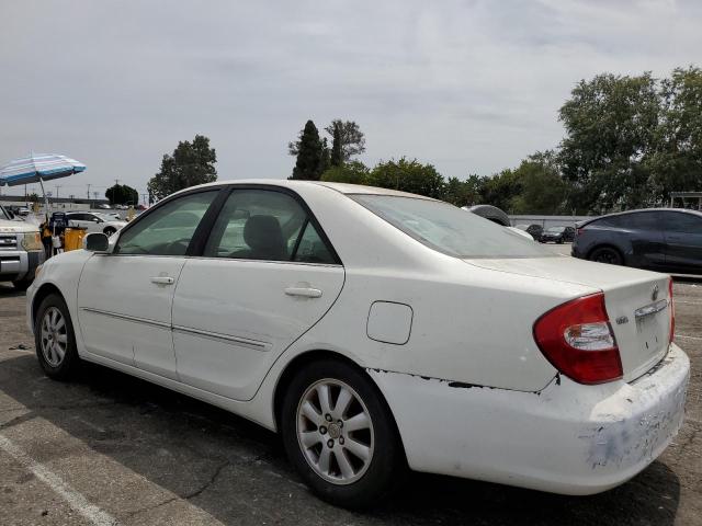 Photo 2 from auction – 2003 TOYOTA CAMRY LE with VIN JTDBE32K830234238