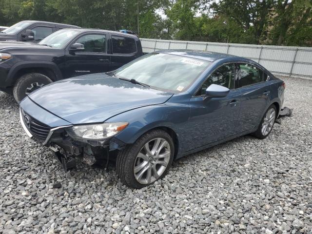MAZDA 6 2014 with VIN JM1GJ1V53E1103551 - Photo from auction