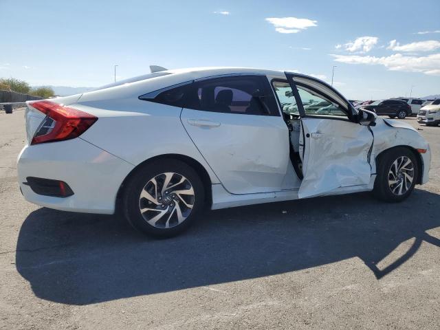 Photo 3 from auction – 2018 HONDA CIVIC EX with VIN 19XFC2F73JE019958
