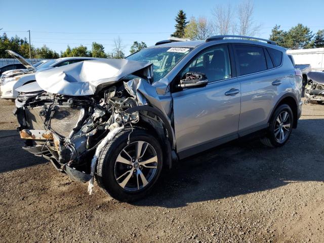 TOYOTA RAV4 LE 2018 with VIN 2T3ZFREV2JW496267 - Photo from auction