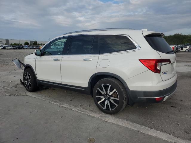 Photo 2 from auction – 2021 HONDA PILOT TOUR with VIN 5FNYF5H99MB039369