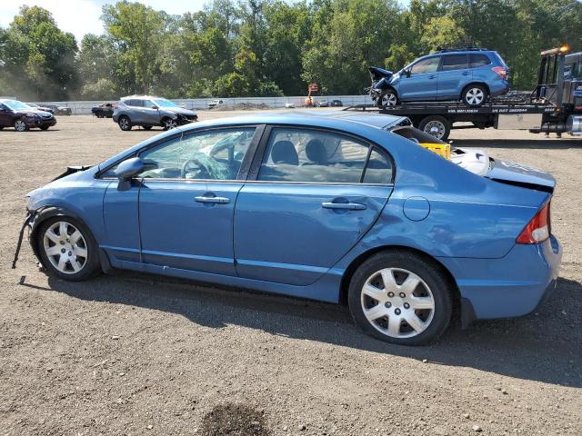 Photo 2 from auction – 2011 HONDA CIVIC LX with VIN 19XFA1F54BE047817