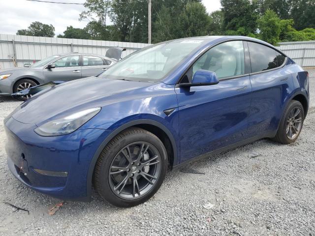 TESLA MODEL Y 2024 with VIN 7SAYGDEE2RA327301 - Photo from auction