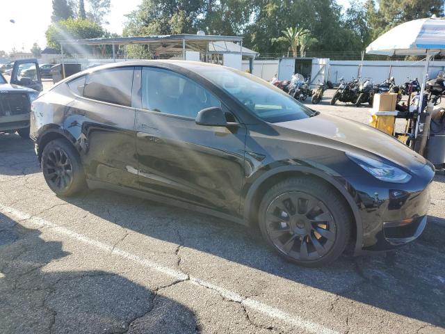 Photo 4 from auction – 2021 TESLA MODEL Y with VIN 5YJYGDEE8MF097711