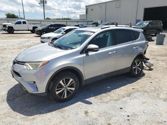 TOYOTA RAV4 XLE 2016 with VIN 2T3WFREV0GW262883 - Photo from auction