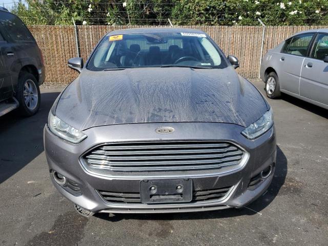 Photo 5 from auction – 2013 FORD FUSION TITANIUM PHEV with VIN 3FA6P0SU4DR297291