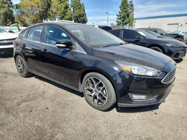 Photo 4 from auction – 2018 FORD FOCUS SEL with VIN 1FADP3M23JL303872