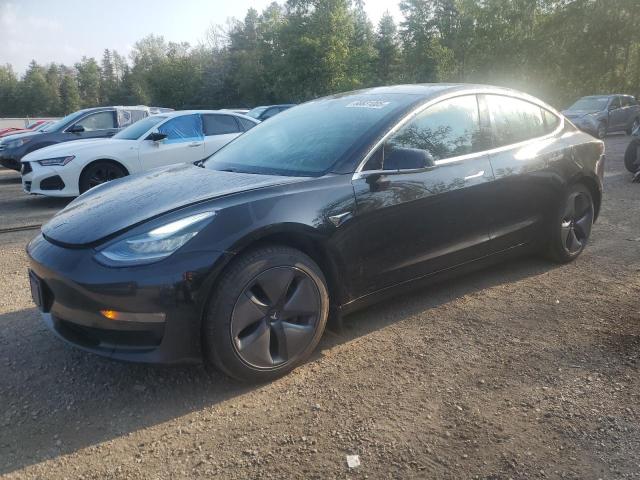 TESLA MODEL 3 2018 with VIN 5YJ3E1EA0JF028647 - Photo from auction