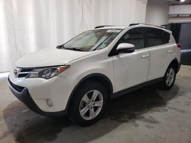 TOYOTA RAV4 XLE 2014 with VIN JTMWFREVXEJ011798 - Photo from auction
