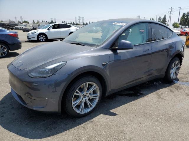TESLA MODEL Y 2023 con VIN 7SAYGAEE5PF811218 - Foto de la subasta