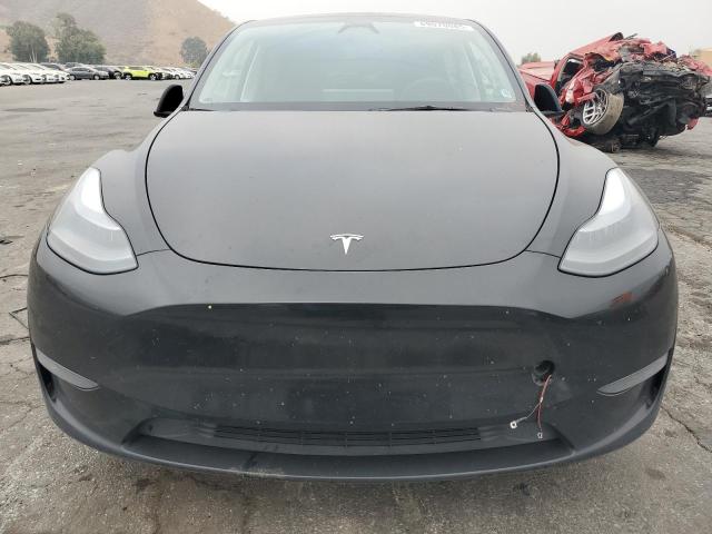 Photo 5 from auction – 2023 TESLA MODEL Y with VIN 7SAYGDEE2PF941250