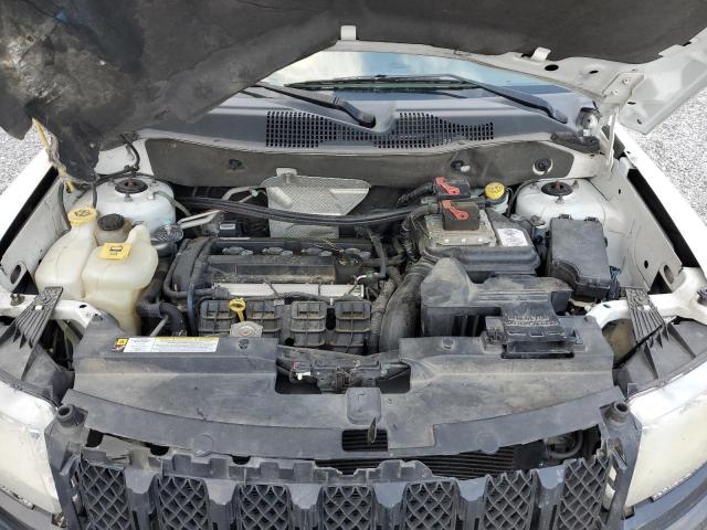 Photo 12 from auction – 2011 JEEP COMPASS SPORT with VIN 1J4NT1FA6BD139638