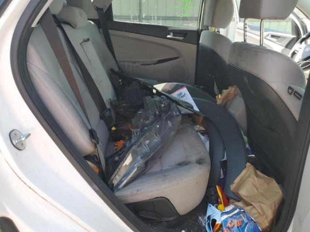 Photo 11 from auction – 2020 HYUNDAI TUCSON LIM with VIN KM8J3CA44LU105793