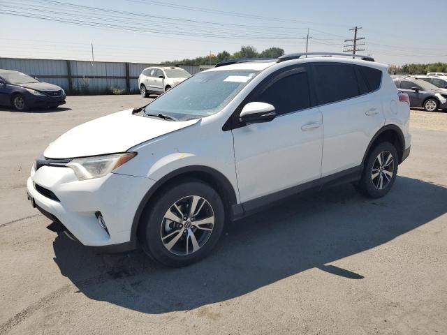 TOYOTA RAV4 XLE 2017 with VIN JTMRFREV3HD209557 - Photo from auction