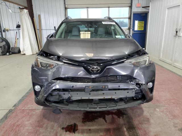 Photo 5 from auction – 2017 TOYOTA RAV4 LIMIT with VIN JTMDFREV8HJ700797
