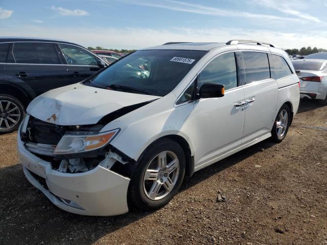 HONDA ODYSSEY TO 2012 with VIN 5FNRL5H99CB031896 - Photo from auction