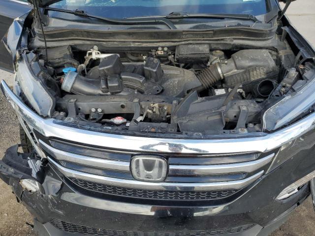 Photo 12 from auction – 2018 HONDA PILOT ELITE with VIN 5FNYF6H07JB038353