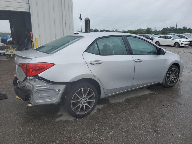 Photo 3 from auction – 2017 TOYOTA COROLLA L with VIN 5YFBURHE2HP623509