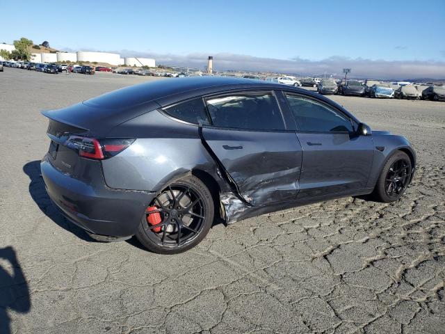 Photo 3 from auction – 2021 TESLA MODEL 3 with VIN 5YJ3E1EC0MF050797