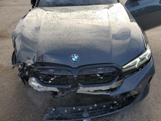 Photo 11 from auction – 2024 BMW M340XI with VIN 3MW49FF03R8E44068
