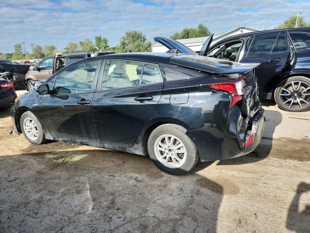 Photo 2 from auction – 2021 TOYOTA PRIUS with VIN JTDKAMFU2M3150221