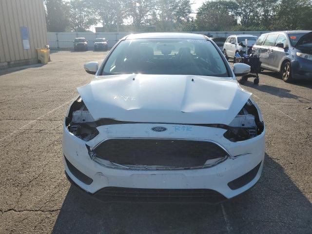 Photo 5 from auction – 2016 FORD FOCUS SE with VIN 1FADP3F26GL383075
