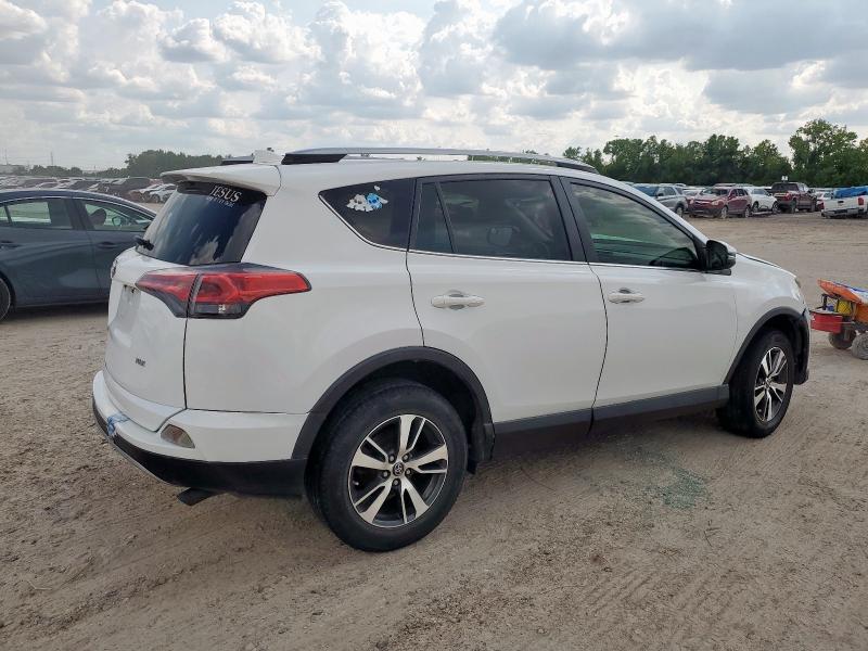 Photo 3 from auction – 2017 TOYOTA RAV4 XLE with VIN JTMWFREV8HD107688