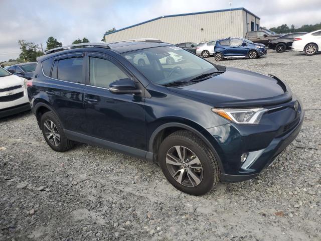 Photo 4 from auction – 2017 TOYOTA RAV4 XLE with VIN JTMWFREV4HD103833