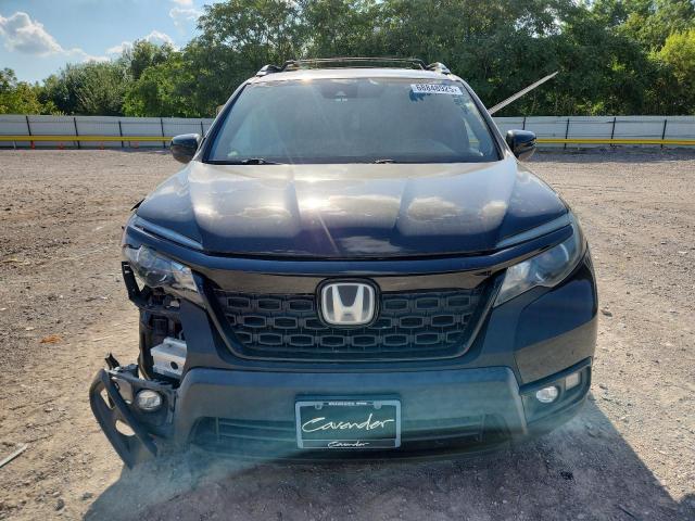 Photo 5 from auction – 2019 HONDA PASSPORT with VIN 5FNYF7H20KB005266